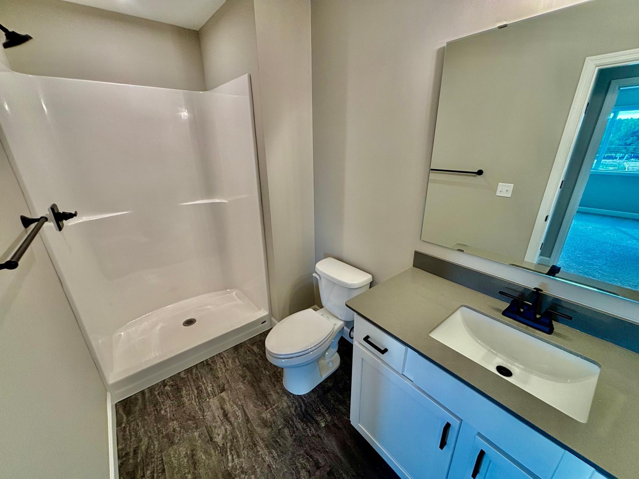 Finished Walkout Basement 3/4 Bath - The Summit at 941 Kepler Ave NE in Oakview Ridge!