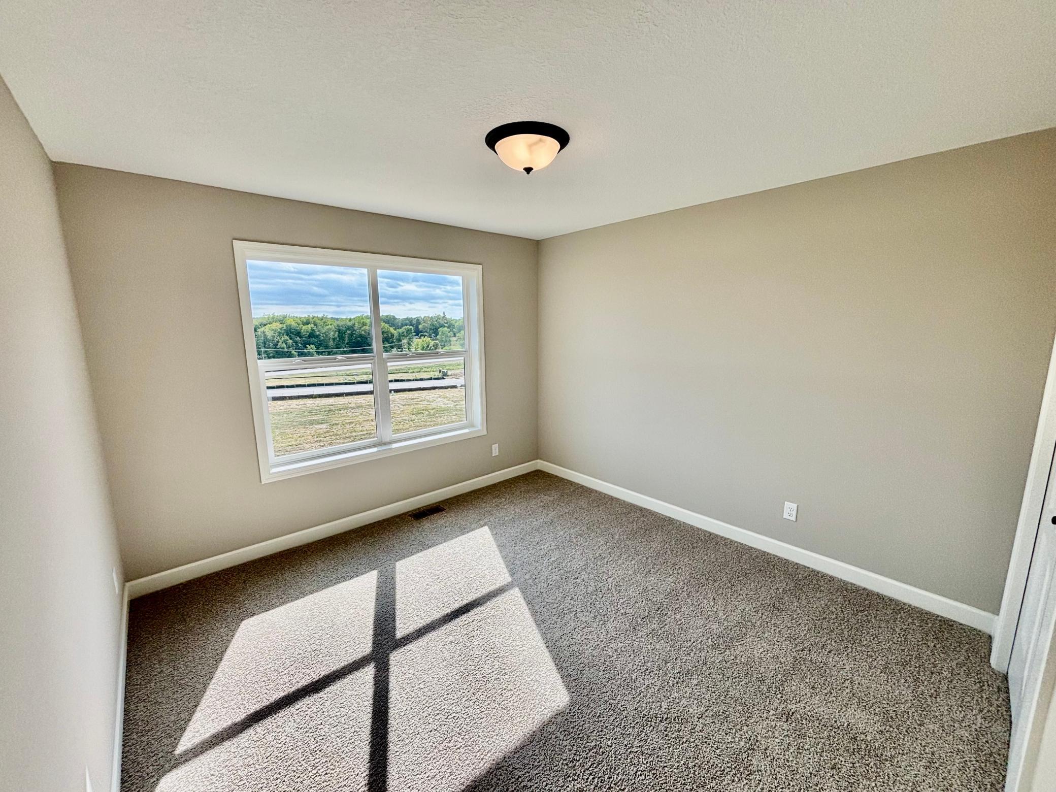 Upper Level Bedroom 3 - The Summit at 941 Kepler Ave NE in Oakview Ridge!