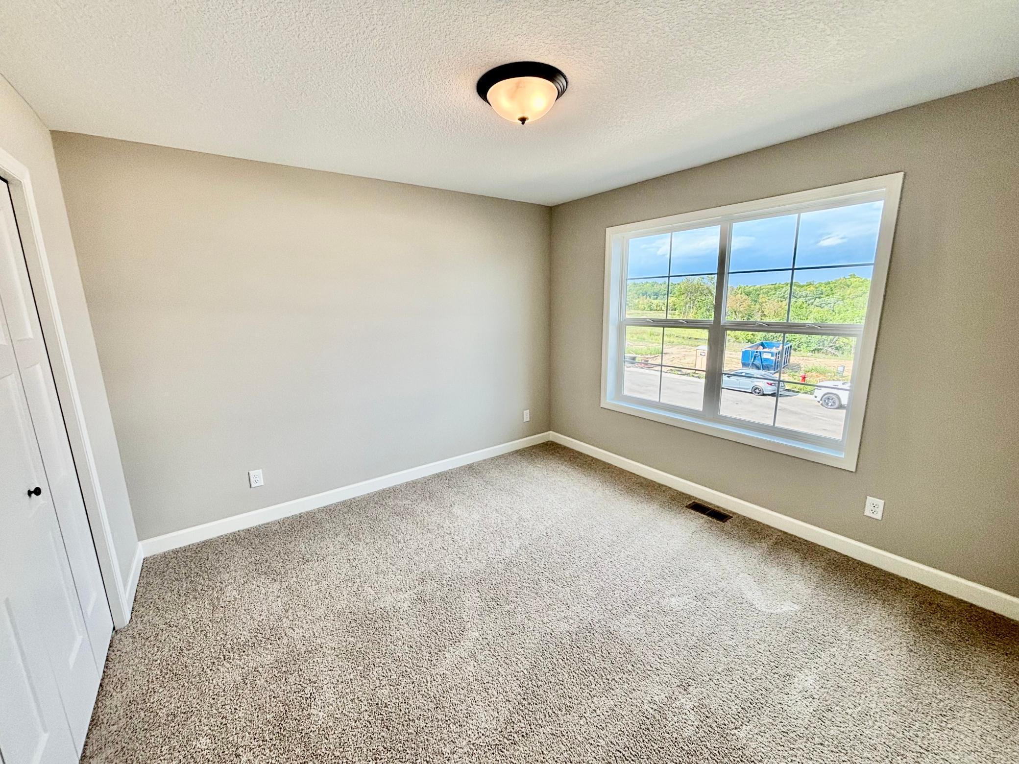 Upper Level Bedroom 2 - The Summit at 941 Kepler Ave NE in Oakview Ridge!