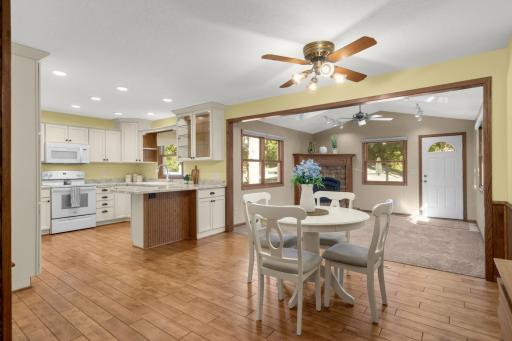 View of Kitchen, Dining Room and the Openness to the Sunroom!