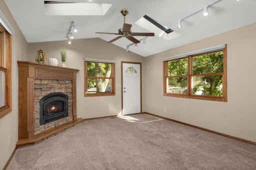 Corner gas fireplace makes the Sunroom a great additional living space.