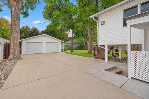 Large 24x24 detached Garage offers plenty of room for vehicles and more.