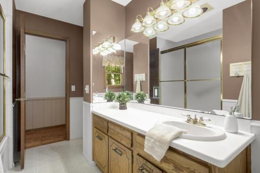 Main-level full Bath conveniently located near all three Bedrooms.