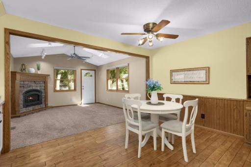 The Dining area opens directly into the vaulted Sunroom addition.