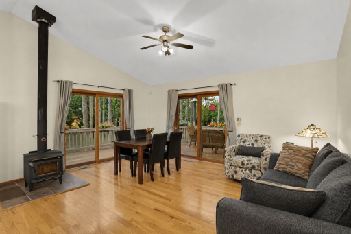 Living room/dining area with wood burning stove
