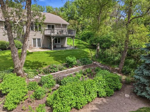 Green space, beautiful landscaping, and a backyard designed to feel calm, private, and connected to nature.