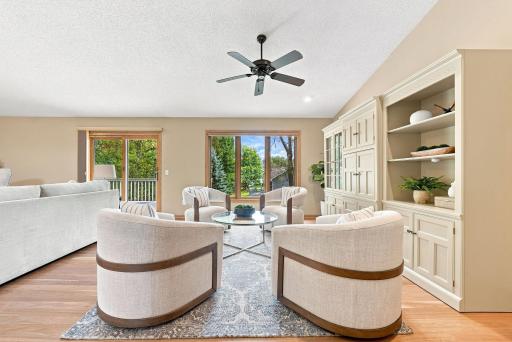 A casual gathering space with room to settle in, unwind, and enjoy the views beyond the windows.