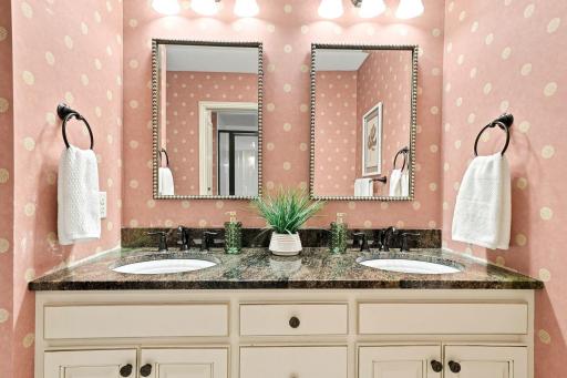 A generous double vanity provides the space and storage that make busy mornings a little easier.