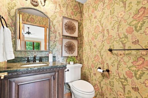 A powder bath with personality, warm finishes, and details that make even the smaller spaces feel thoughtfully finished.