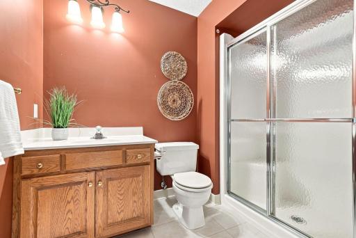 A full lower-level bath makes the guest and recreation spaces even more functional.