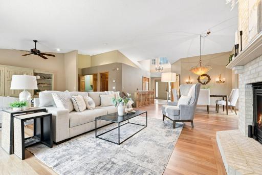 This is the heart of the home. Warm hardwood floors, a fireplace, natural light, and space designed for real life to unfold.
