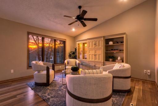 The sunset becomes part of the room, creating a beautiful backdrop for conversation, reading, or simply winding down at home.