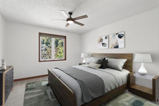 Primary bedroom on the main (virtually staged)