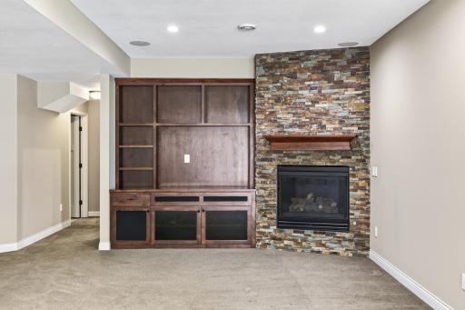 Entertainment center and another gas fireplace
