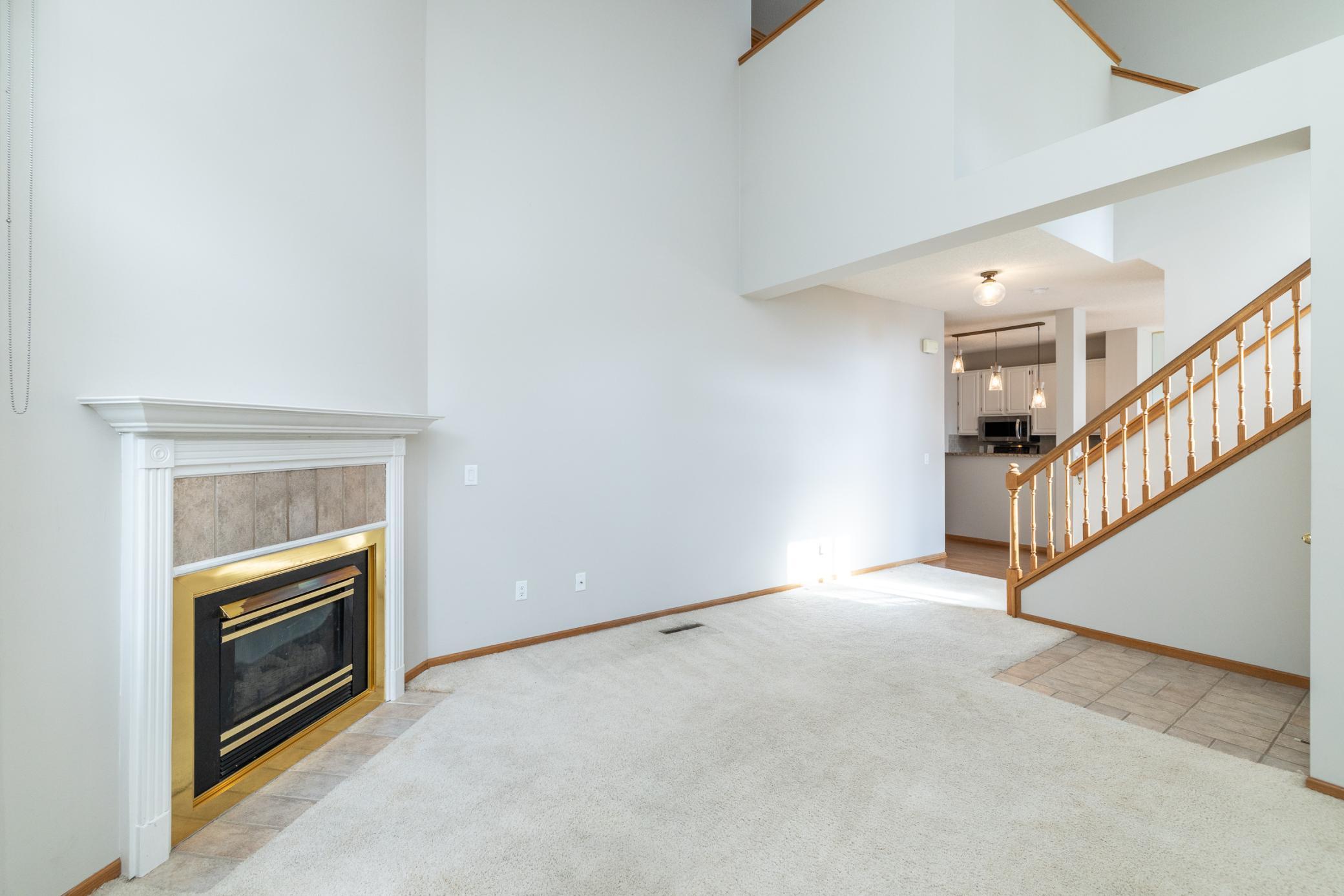 Living room with vaulted ceilings and gas fireplace