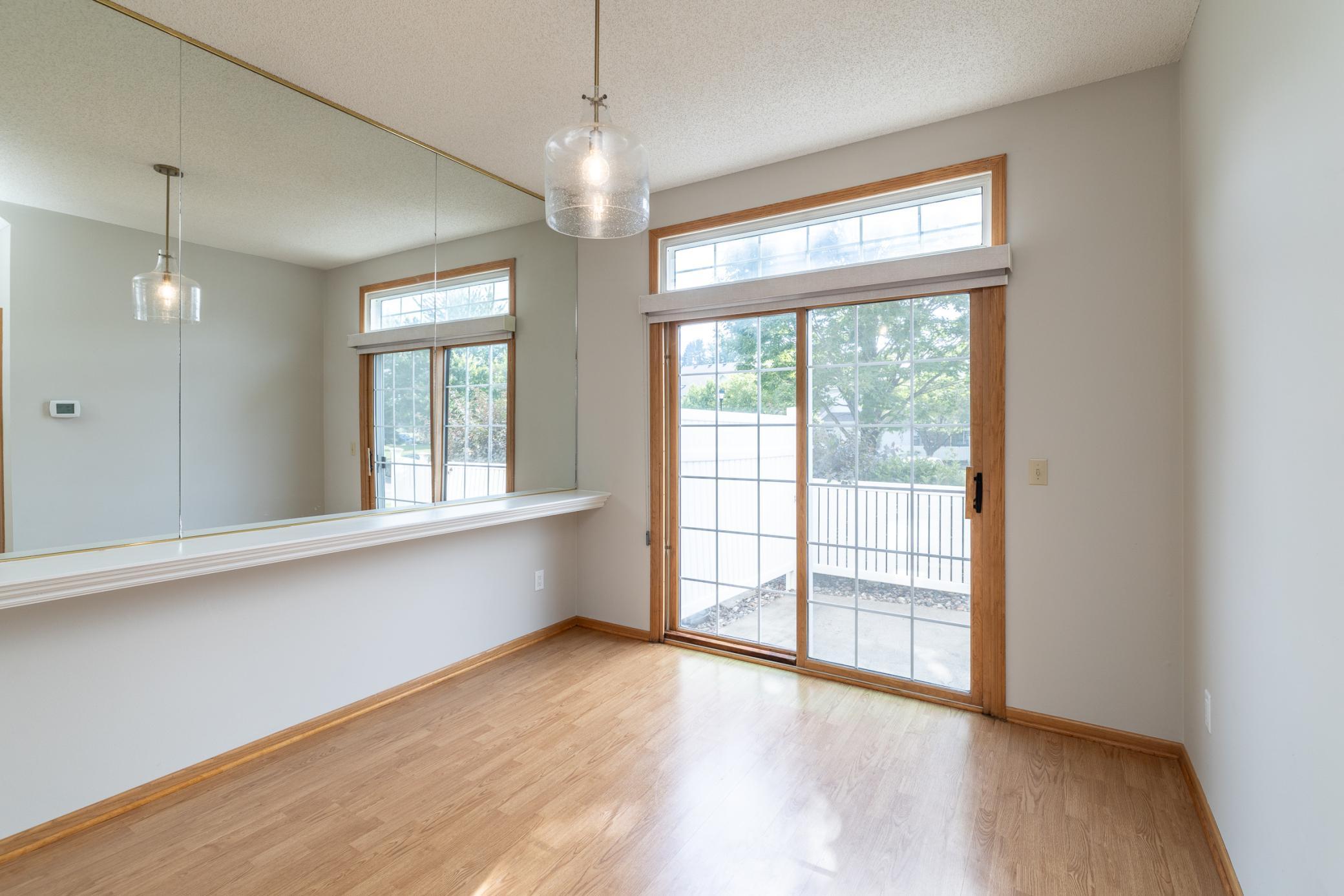 Spacious dining area with walkout to patio