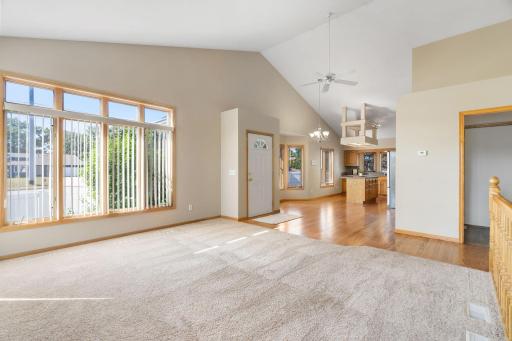 Open floor plan, has beautiful windows, extra lighting detail in the kitchen, refinished hardwood floors.