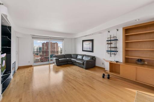 Large open family room with east facing balcony.