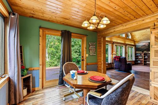 formal dining area walks out to the terraced deck