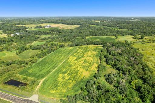 A beautiful aerial view showcasing the expansive 10-acre property and surrounding countryside