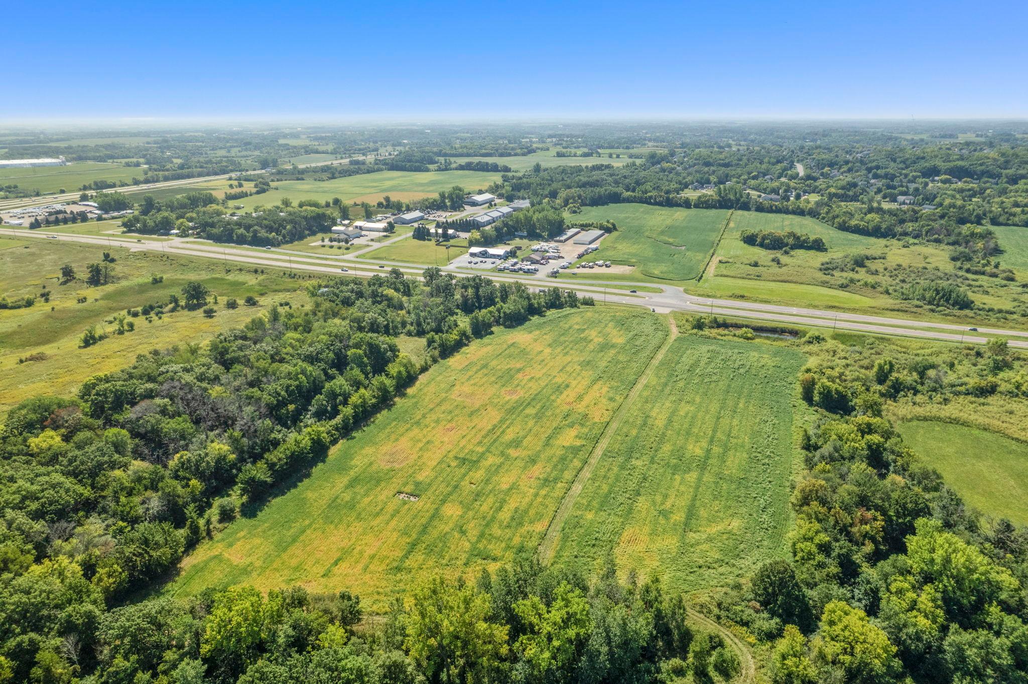 Approximately 10 acres of open land surrounded by mature trees and scenic countryside views