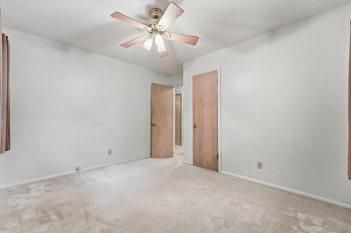 Second bedroom on the main floor. This bedroom features windows on the west and north side of the home.