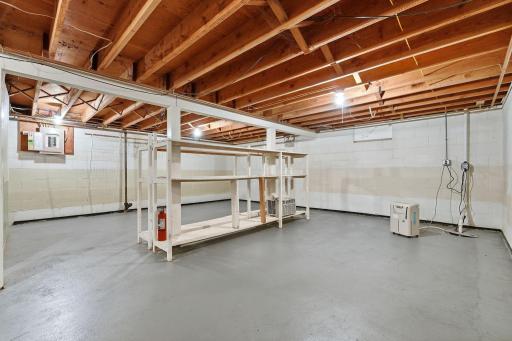 Wide open space. The washer and dryer are located in the lower level. Clean and ready to be finished to your needs. 100 amp electrical service.