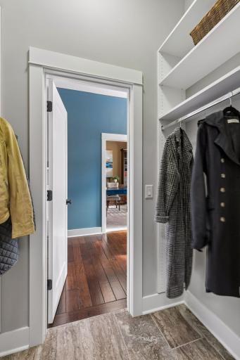 A handy pass-through closet just off of the front entrance that flows to the mudroom.