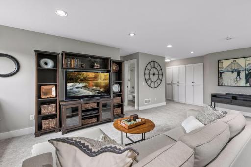 Such a bonus to have this large, versatile loft & convenient storage cabinets off of the hallway! Plus all new carpet on the upper level in Dec 2025.