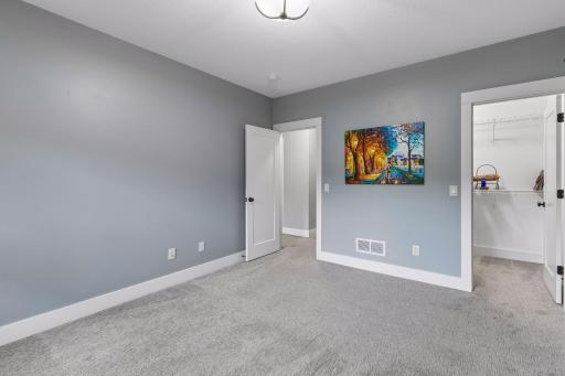 Alternate view of 5th bedroom complete with a walk-in closet & ready to make your own!