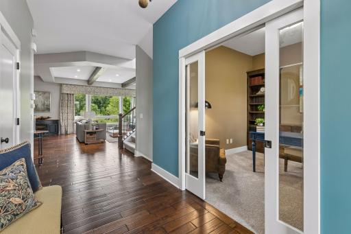 Gleaming hardwood floors & soaring ceilings plus a dedicated office to the right of the front entrance.