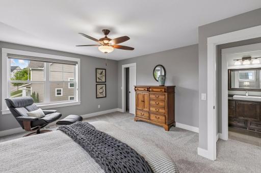 Such a spacious bedroom, complete with a walk-in closet & close proximity to a full bath.