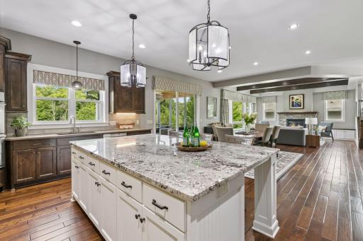 A light filled open floorplan between the Kitchen, Informal Dining and the Great Room.