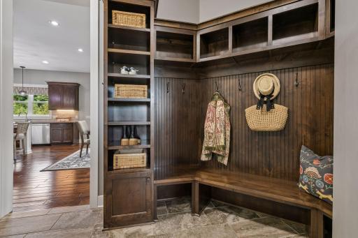 Large mudroom with built-in shelves & cubbies to keep the whole family organized!