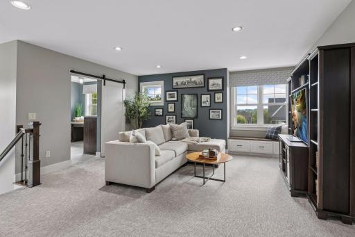 Large flexible loft area providing plenty of space for media area, playspace, home office or home classroom!