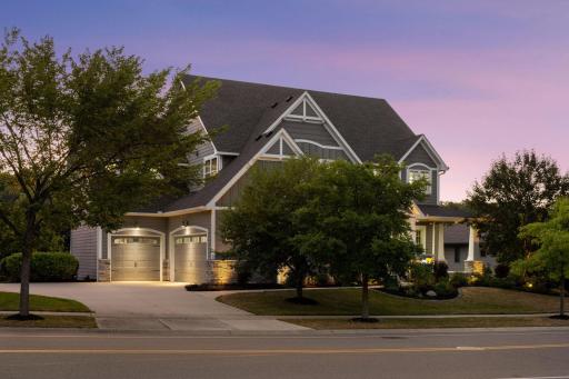 A concrete driveway plus a 3-car heated, oversized garage with an extra deep third stall offering plenty of room for recreational toys!
