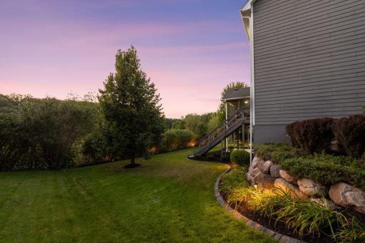 The added exterior lighting around this home is a beautiful touch!