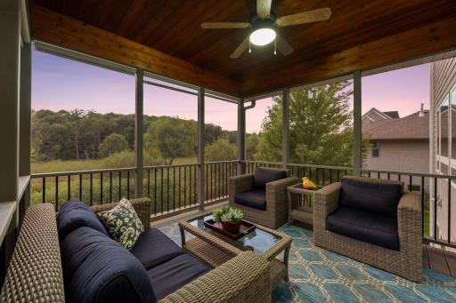 Enjoy bug-free outdoor meals & relaxation in this must have spacious screened porch with composite decking!