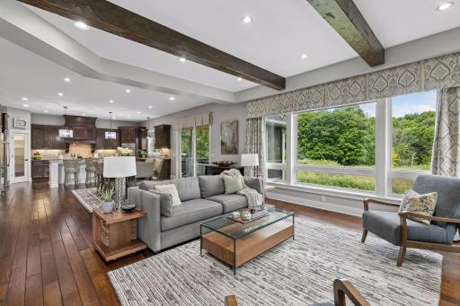 The expansive, private views with soaring ceilings, an open floorplan & timeless finishes are sure to not disappoint!