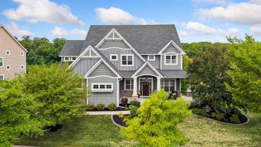 Custom landscaping around the entire home with mature, low maintenance perennials plus irrigation system offering drip zones in the front gardens & window box.