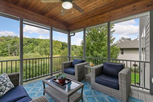Situated on .46 acres with tranquil, private views & a screened porch you're sure to love.
