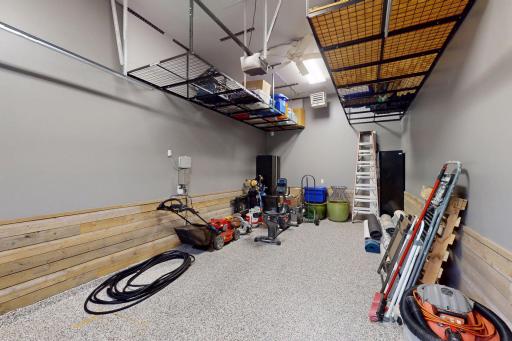 Extra deep 3rd stall with hanging shelves for storage plus plenty of room for recreational toys, too!
