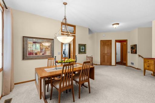 Dining room has pocket door to kitchen and will hold fairly large table