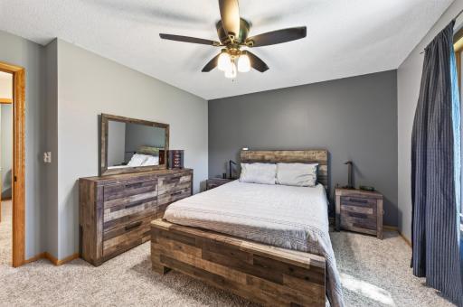 Generous primary suite with plenty of natural light, a walk-in closet, and private bath.