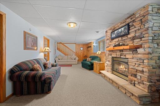 Lower level family room with gas fireplace
