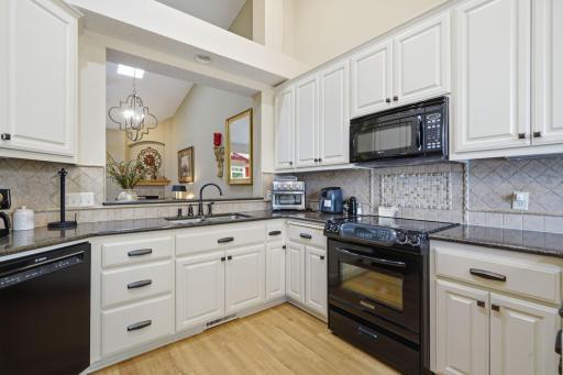 Kitchen opening to living area
