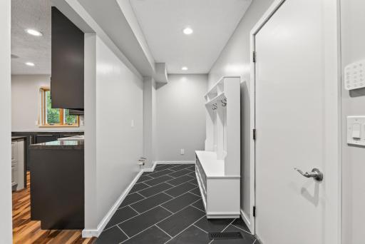 Mudroom/Laundry Room between Garage and Kitchen.