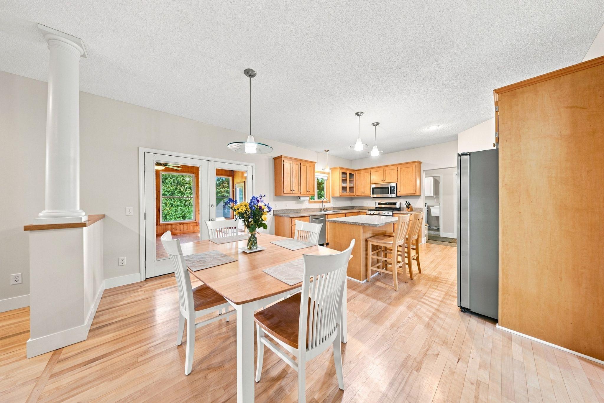 Informal Dining & Kitchen w/ Access to 4-Season Porch