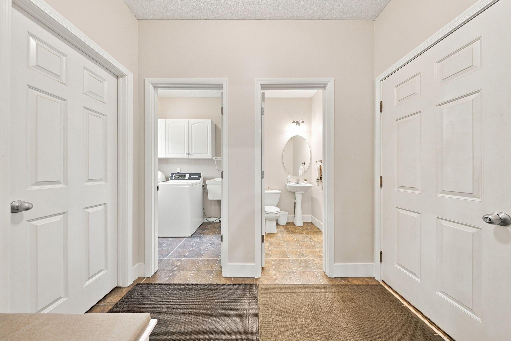 Garage Entry with 1/2 Bath & Laundry - Main Floor