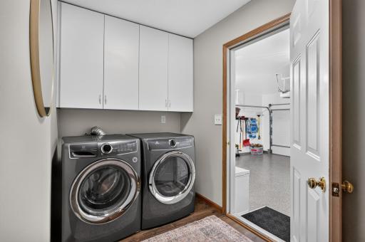 Main floor laundry includes the washer and dryer